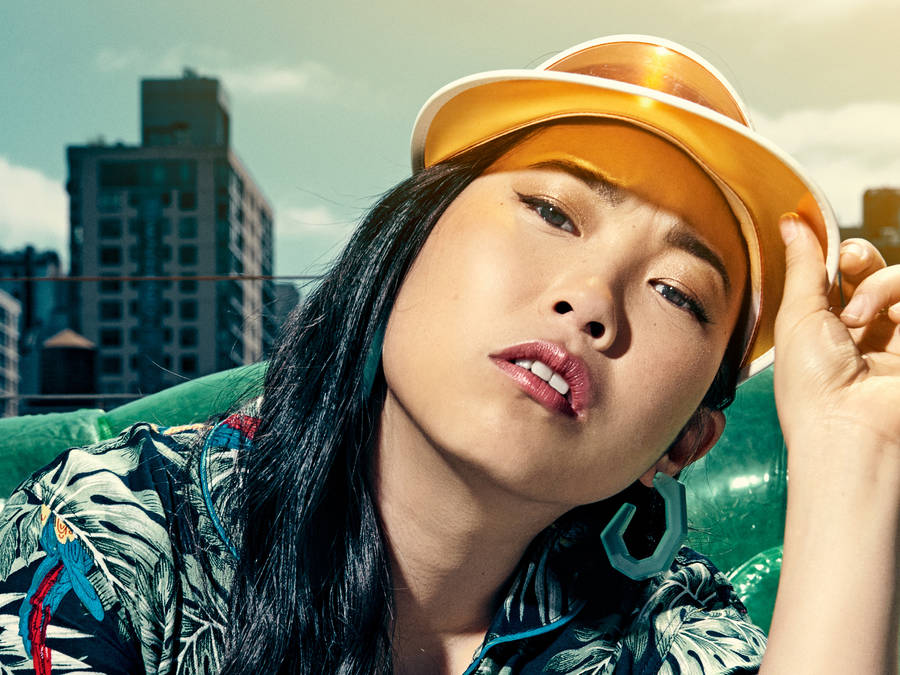 Awkwafina Yellow Sun-visor Wallpaper