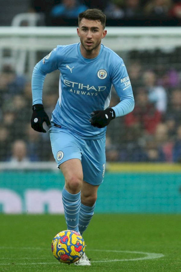 Aymeric Laporte Running With Football Wallpaper