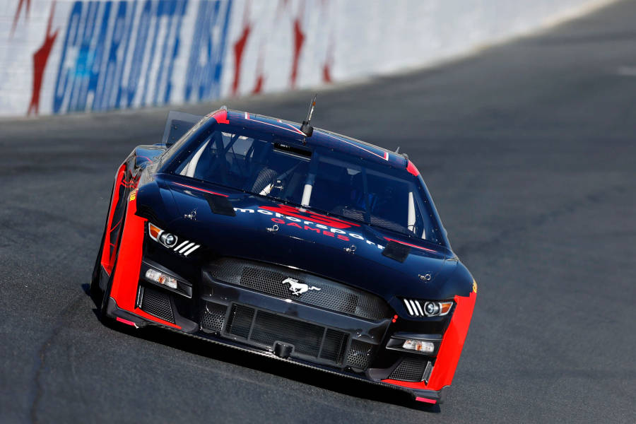 B.j. Mcleod Speeding The Ford Mustang In A Nascar Race Wallpaper