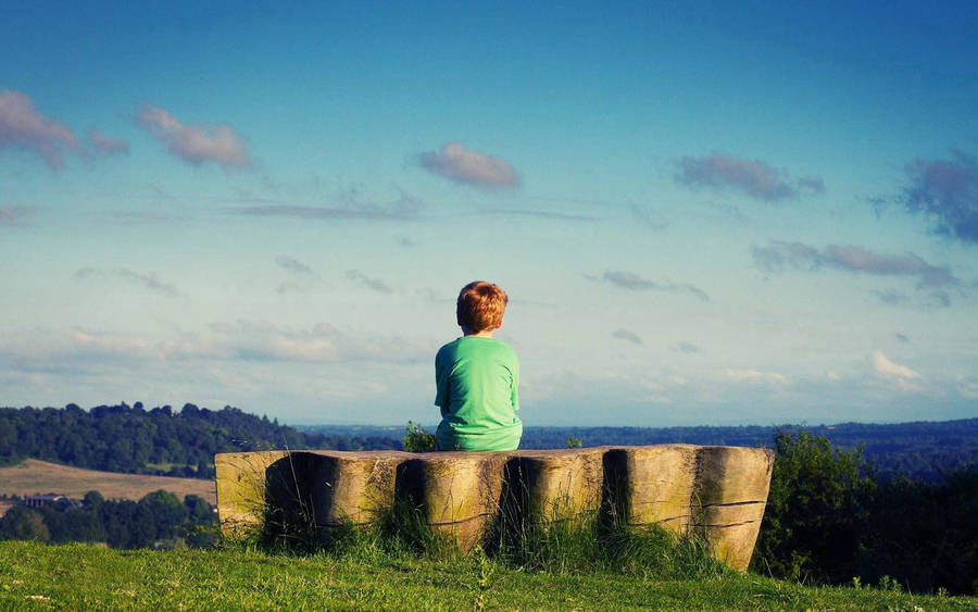 Baby Boy On Stone Bench Wallpaper