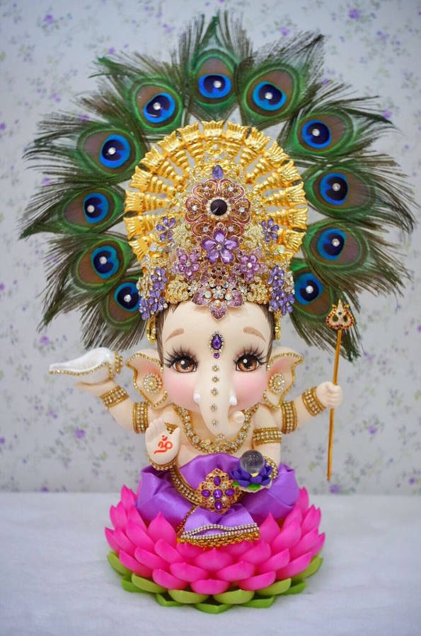 Baby Ganesh Peacock Figurine Wallpaper