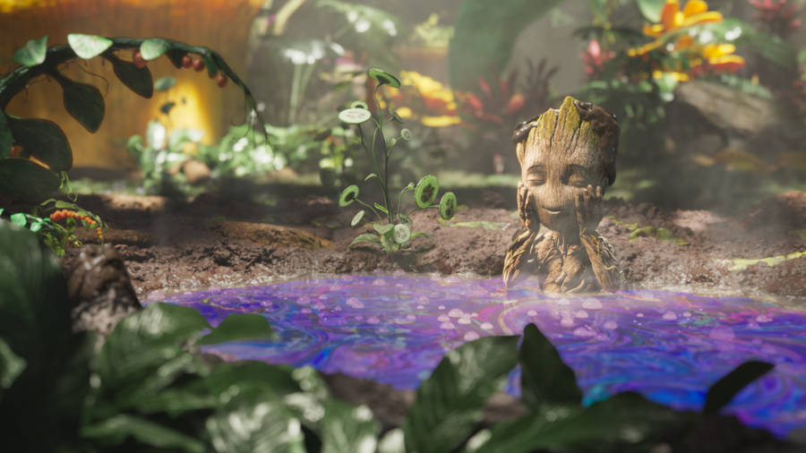 Baby Groot Enjoying His Mud Bath Wallpaper