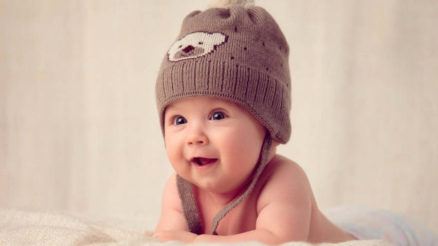 Baby In Brown Bonnet Wallpaper