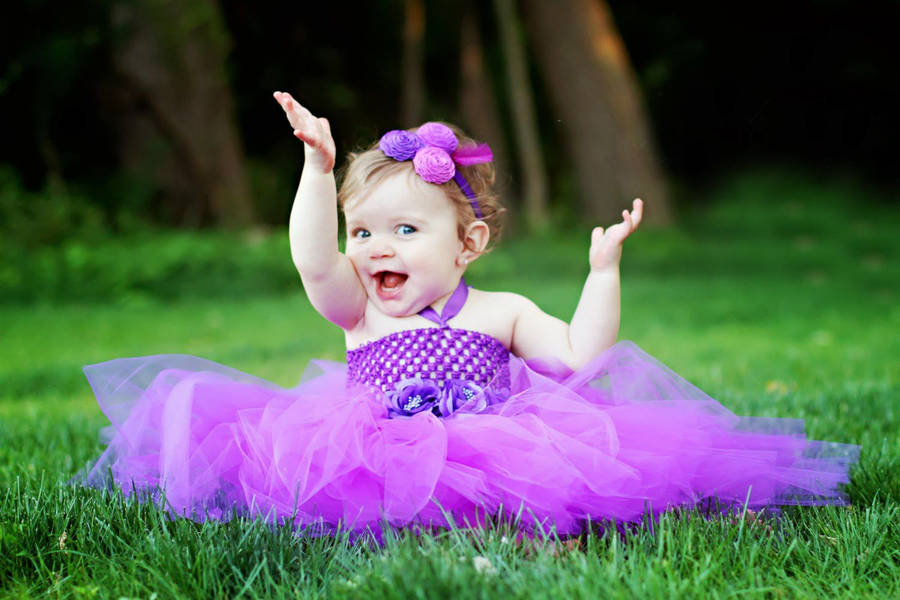 Baby In Purple Gown Wallpaper