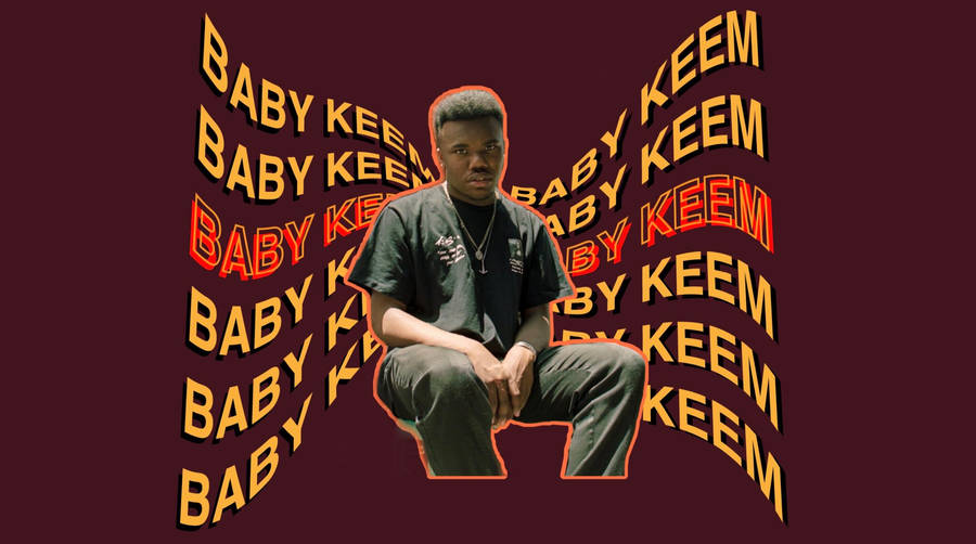 Baby Keem In Maroon Wallpaper