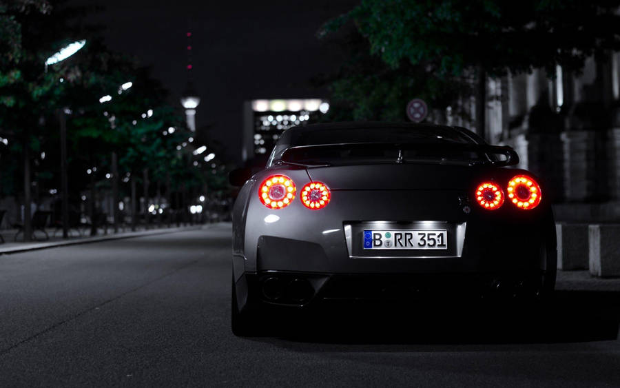 Back View Of A Silver Nissan Gtr Wallpaper