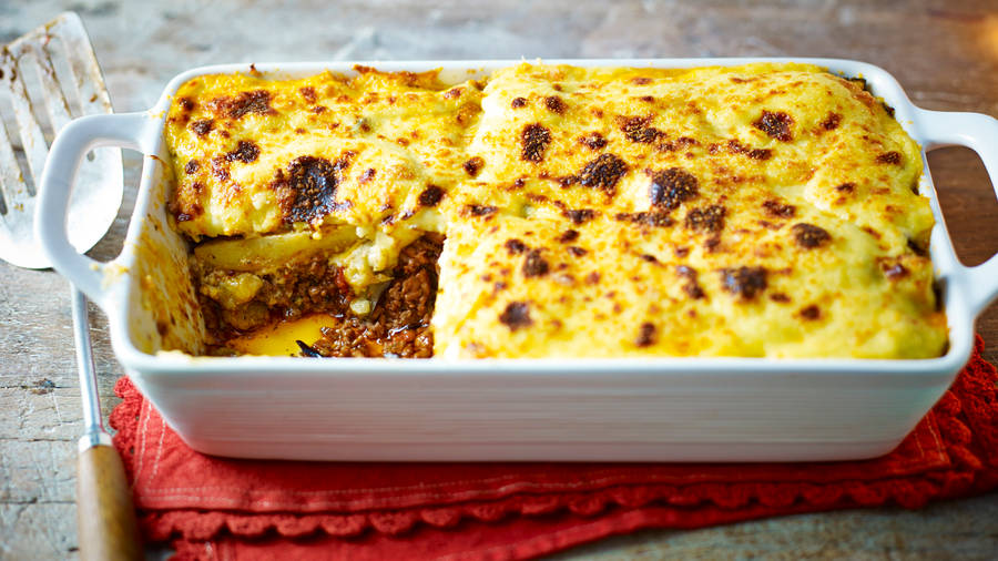 Baked Moussaka On A White Ceramic Tray Wallpaper