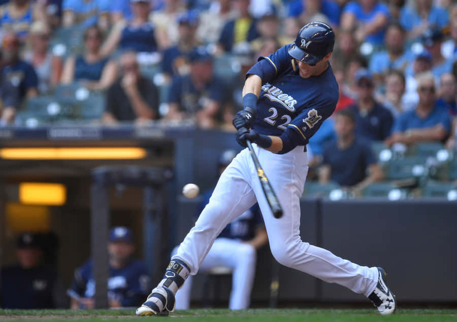 Baseball Player Swinging Bat Wallpaper