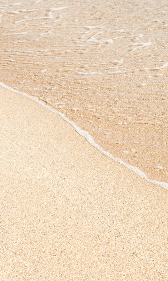 Beach Sand With Beige Background Wallpaper