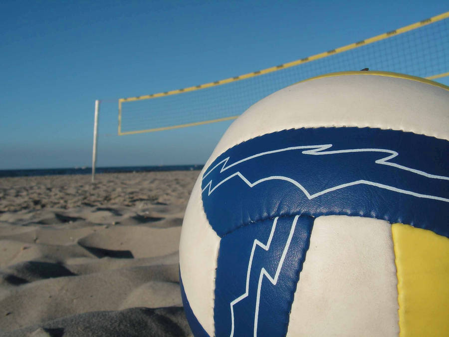 Beach Volleyball Match In Action Wallpaper