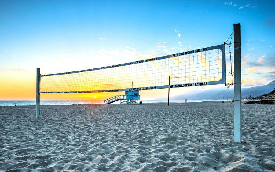 Beach Volleyball Net And Lifeguard Post Wallpaper