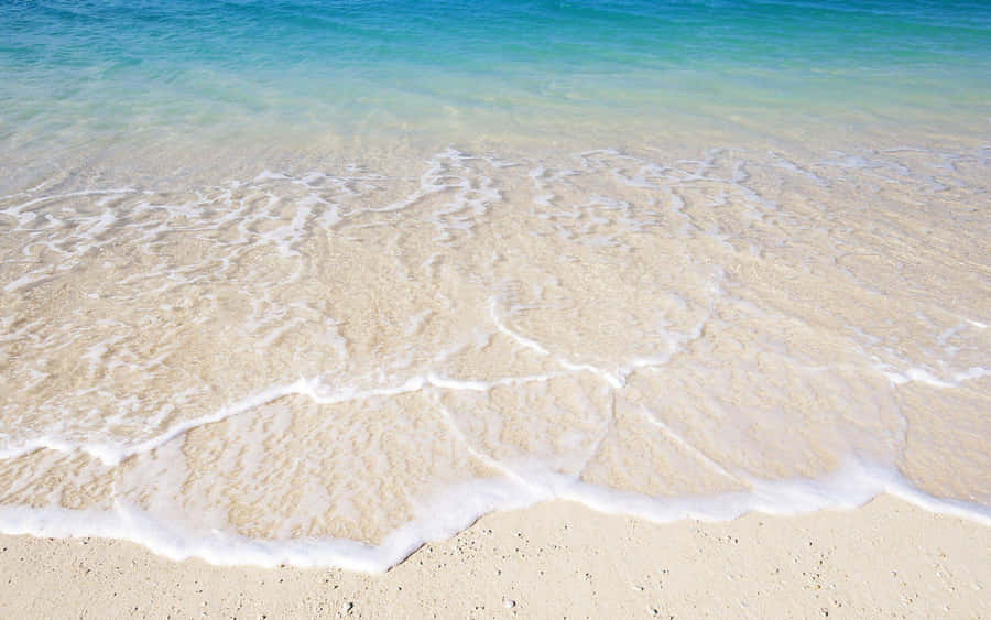 Beach Waves Hitting Sand Wallpaper