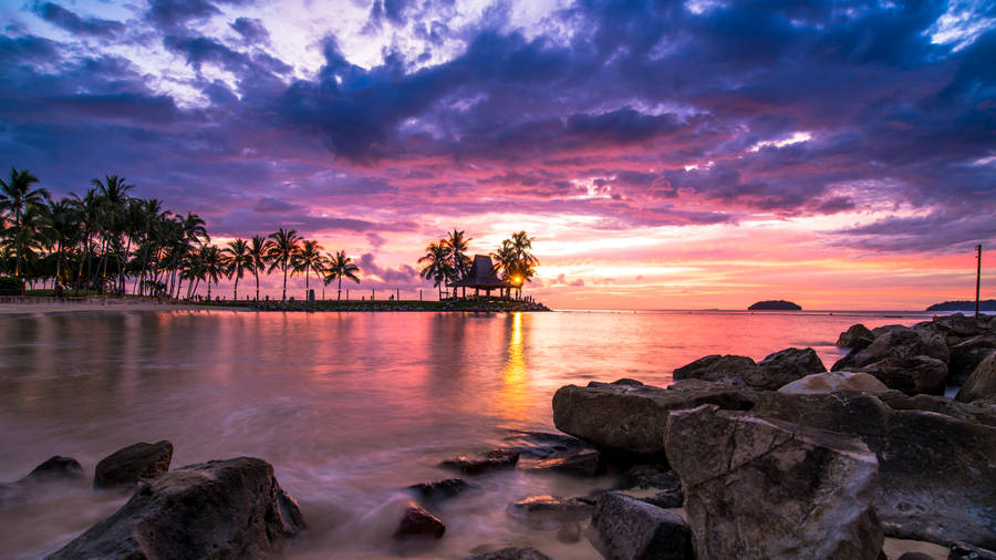 Beautiful Beach With Pink Sunset Wallpaper