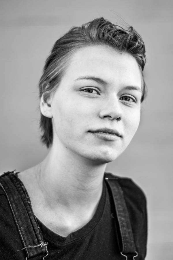 Beautiful Black And White Portrait Shot Of A Teenage Girl Wallpaper