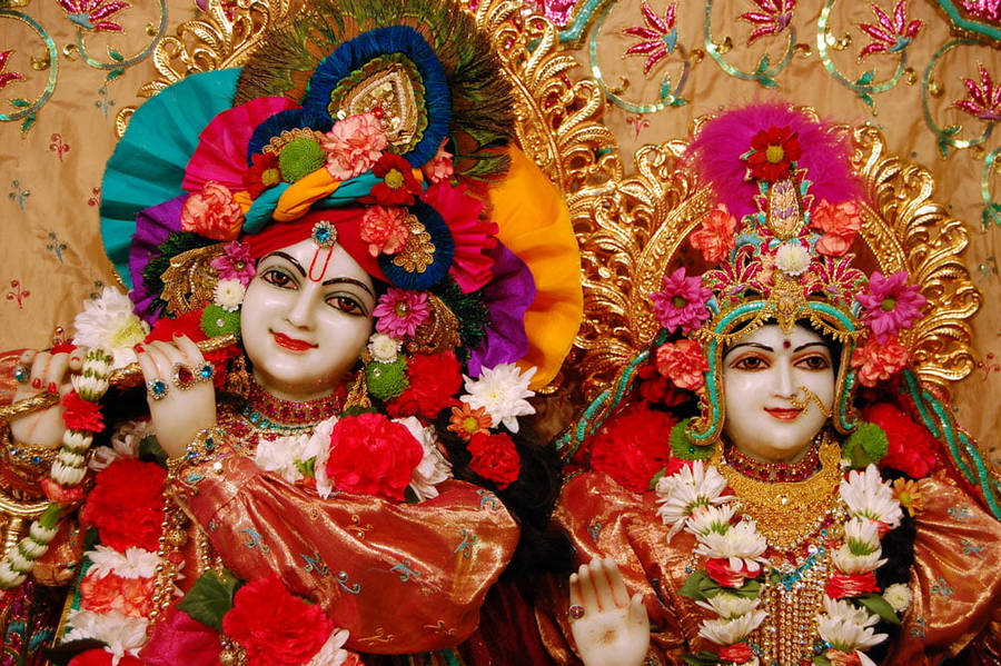 Beautiful Krishna And Radha Decorated Statues Wallpaper