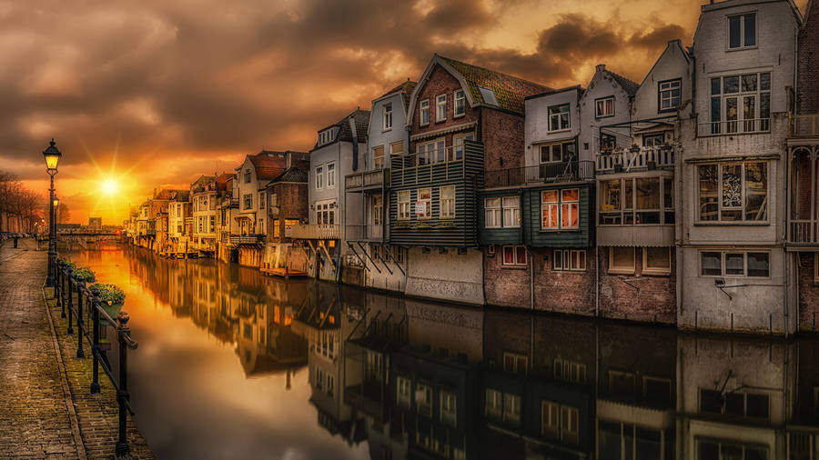 Beautiful Scenery Houses By The River Wallpaper