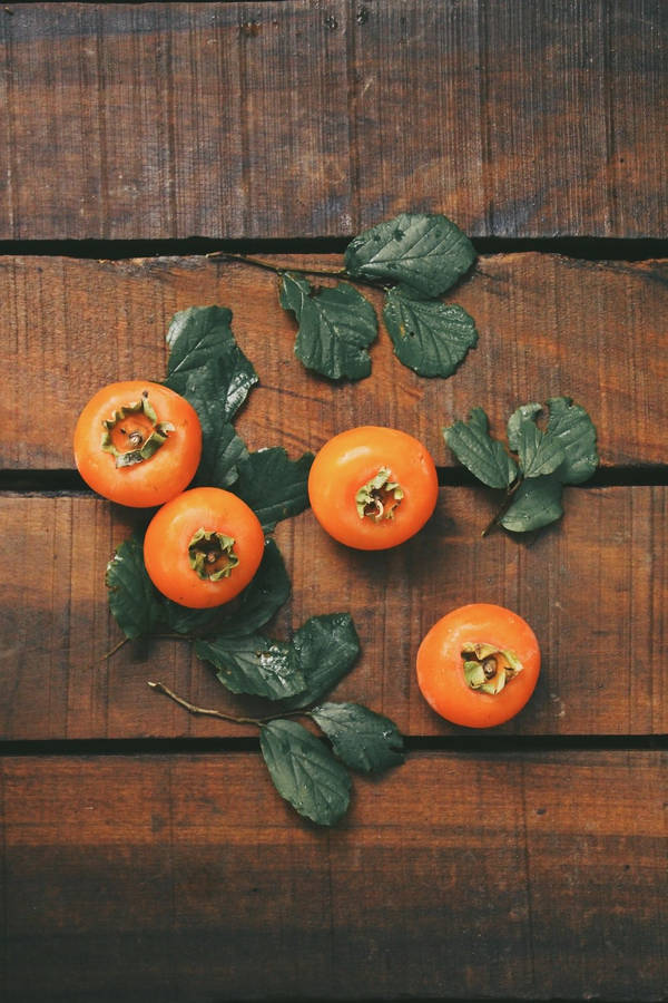 Beautiful Shot Of Persimmon Fruit Wallpaper