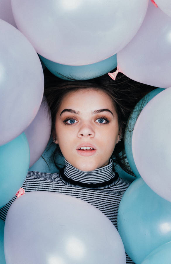 Beautiful Teenage Girl In Balloons Wallpaper