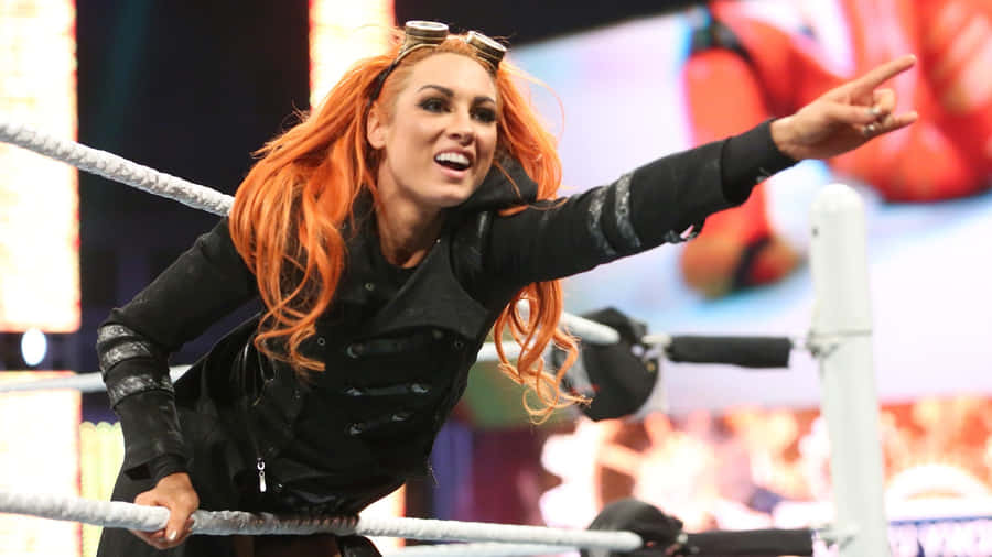 Becky Lynch Rock Hand Sign Wallpaper