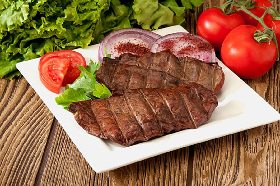 Beef Liver Slices On A Square Platter Wallpaper