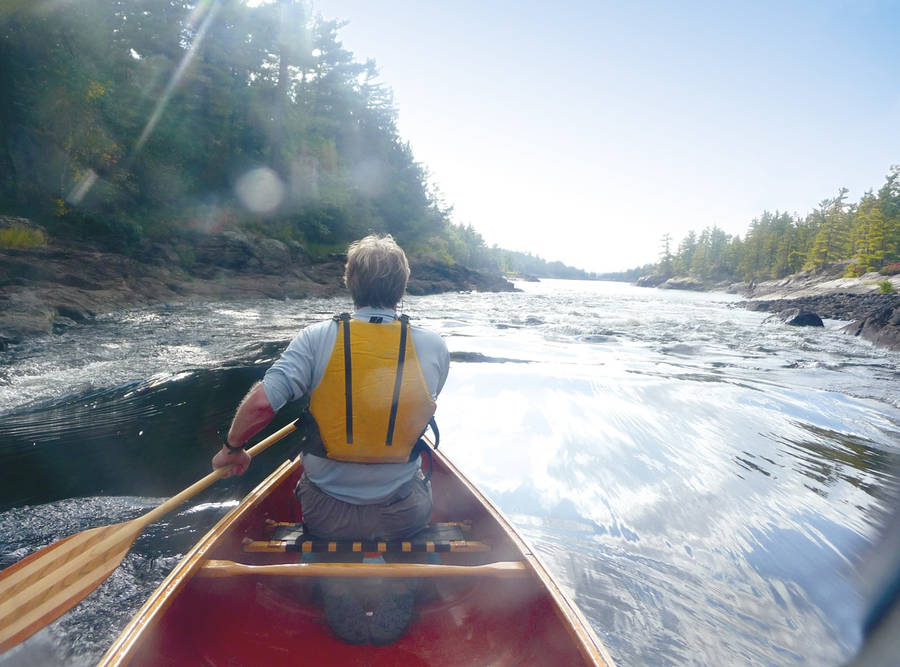 Behind The Canoeing Man Wallpaper