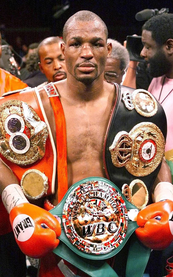 Bernard Hopkins Carrying His Title Belts Wallpaper