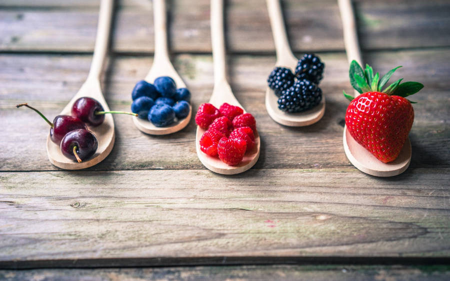 Berries On Wooden Spatulas Wallpaper