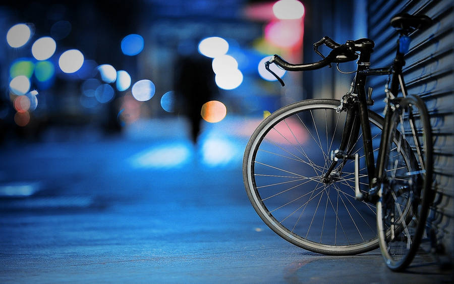 Bicycle At Nighttime Wallpaper