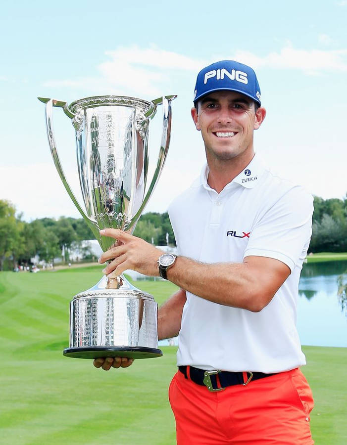 Billy Horschel Celebrating Victory With Silver Trophy Wallpaper