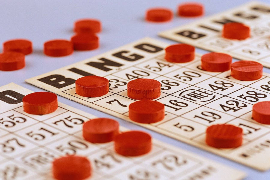 Bingo Cards And Red Pins Wallpaper