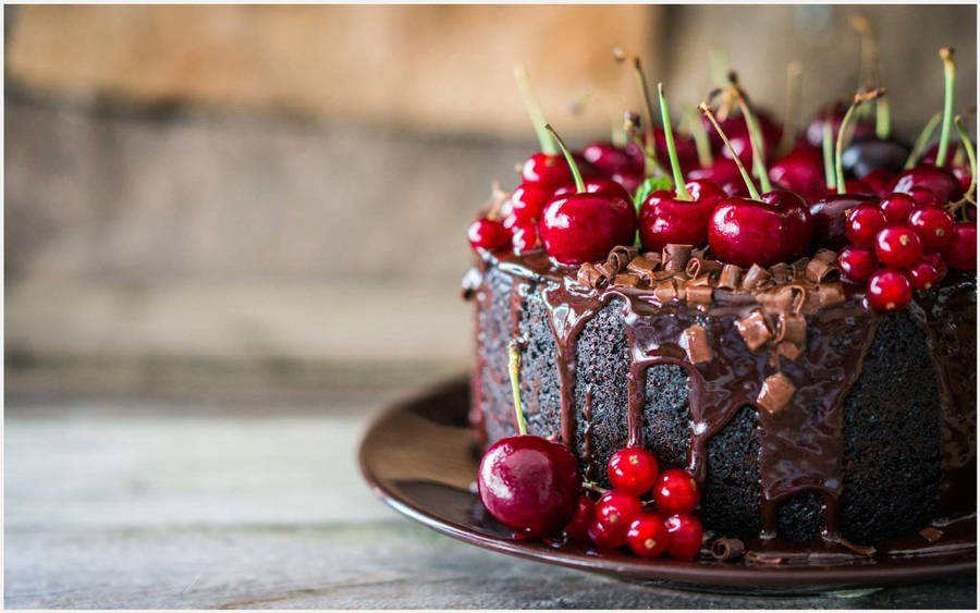 Birthday Cake Topped With Cherries Wallpaper