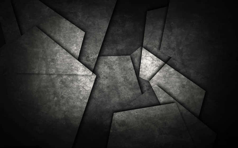 Black And Gray Tiles In A Pile Wallpaper