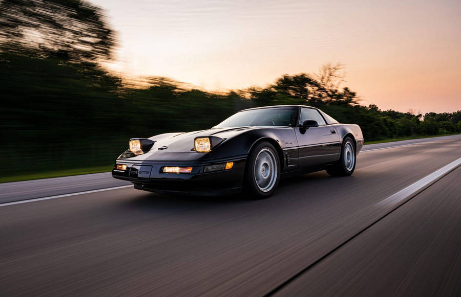 Black C4 Corvette In Motion Wallpaper