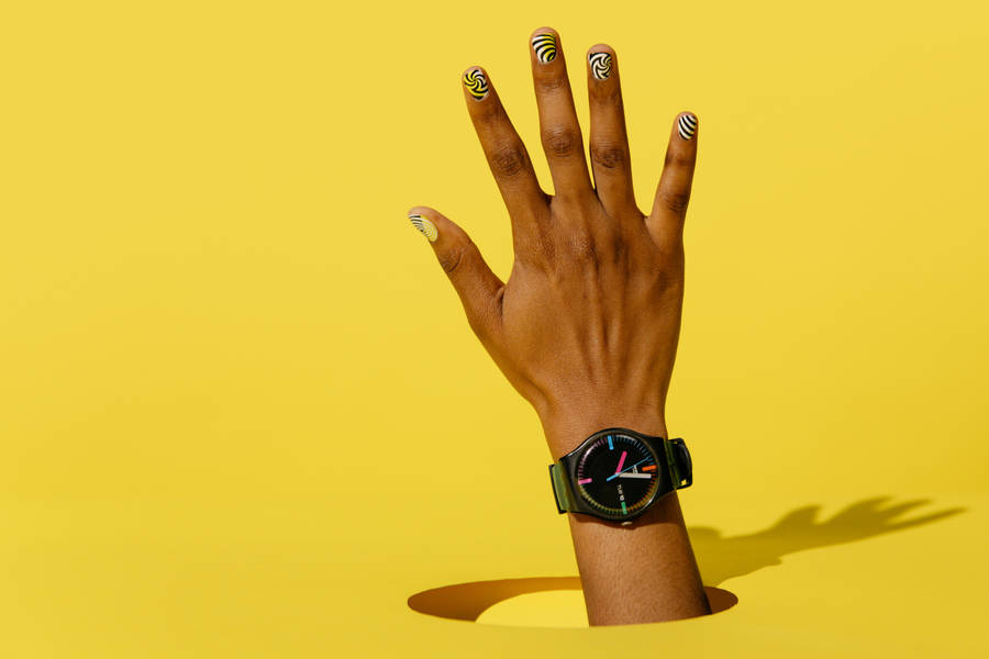Black Casual Watch Yellow Background Wallpaper