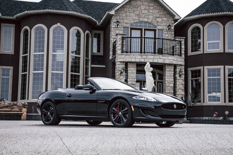 Black Convertible Maserati At Mansion Wallpaper