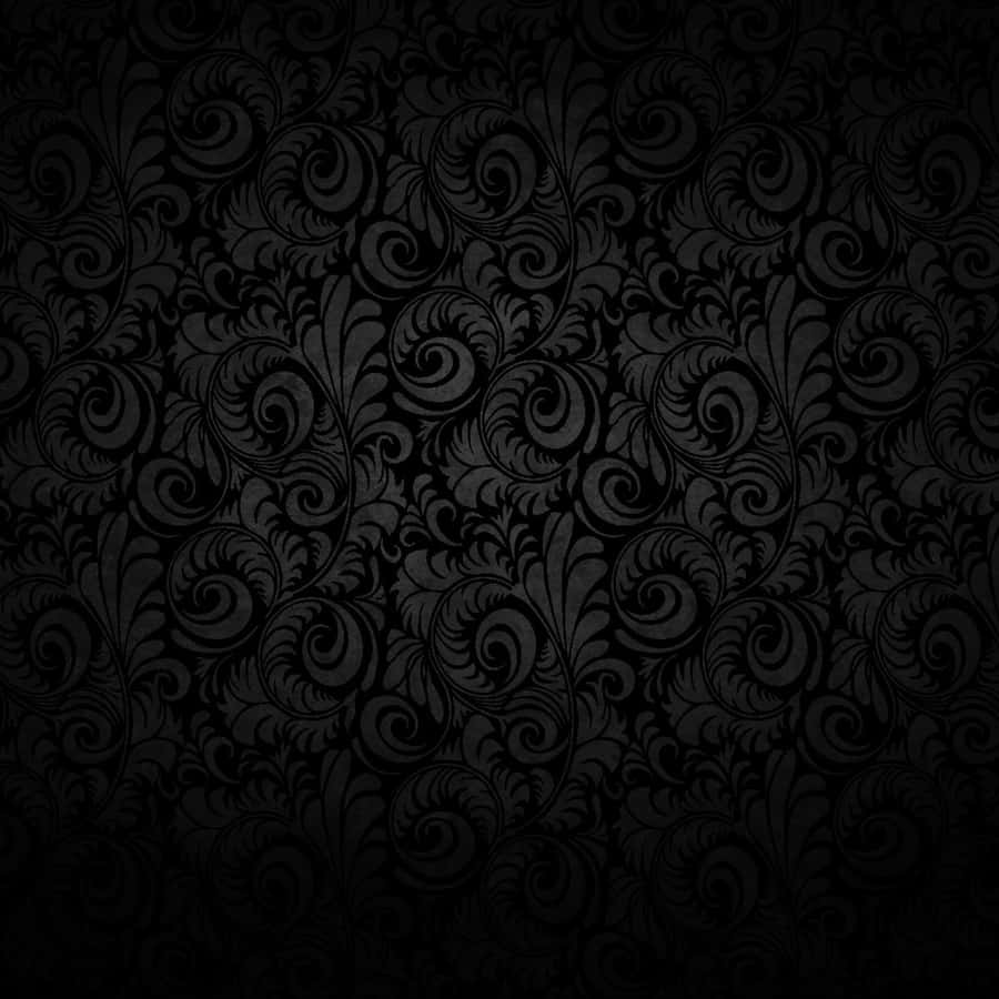 Black Ipad With Spiral Abstract Patterns Wallpaper