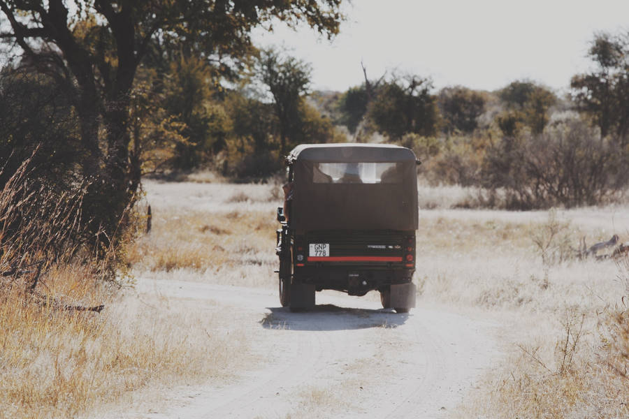 Black Jeep Cool Truck Driving Away Wallpaper