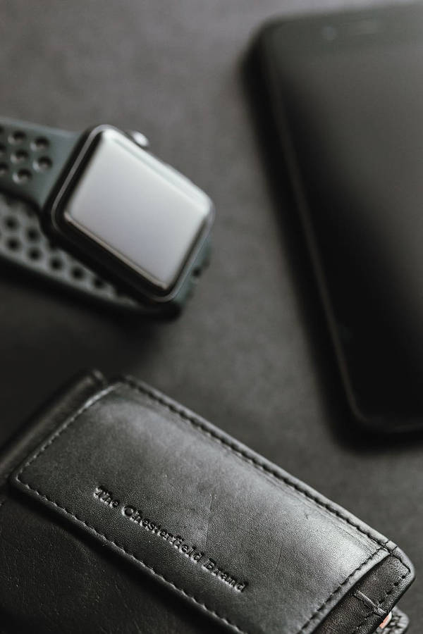 Black Leather Iphone Wallet And Watch Wallpaper