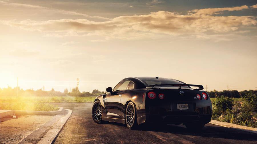 Black Nissan Gtr Car During Sunset Wallpaper