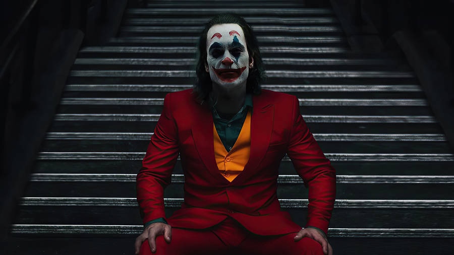 Black Ultra Hd Joker On A Staircase Wallpaper