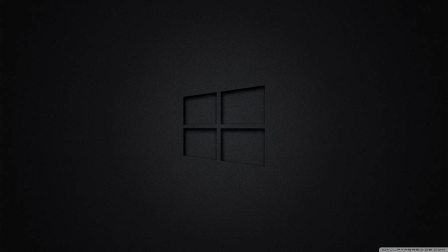 Black Windows Logo On A Dark Screen Wallpaper