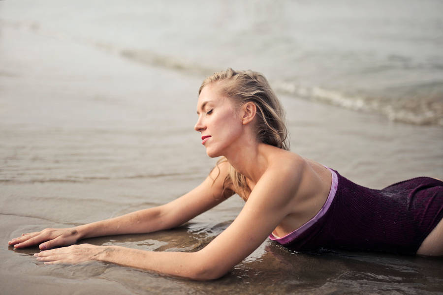 Blonde Beach Girl On Shore Wallpaper