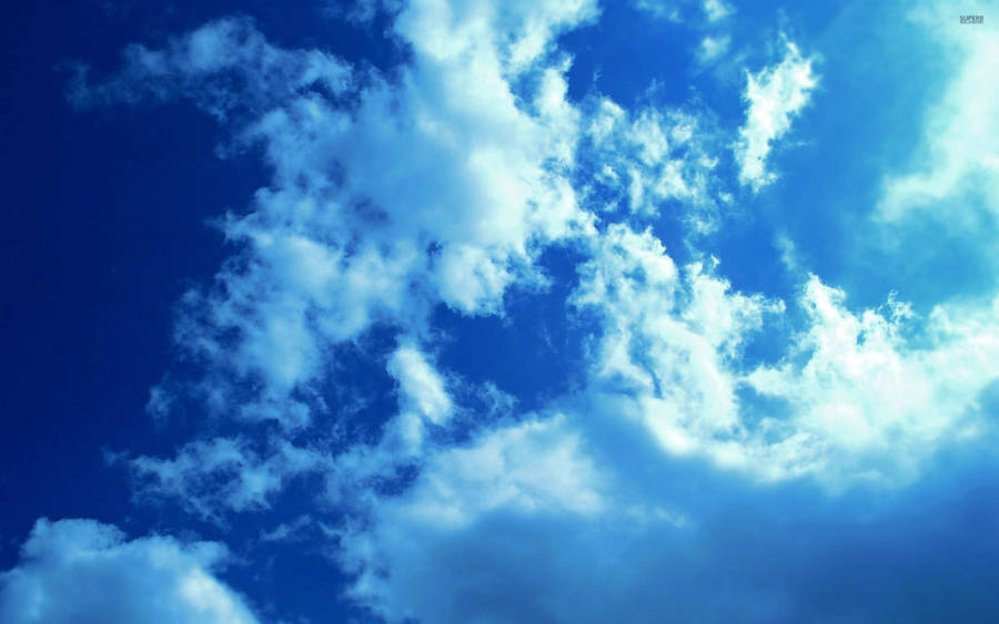 Blue And White Vastness Of The Sky Wallpaper