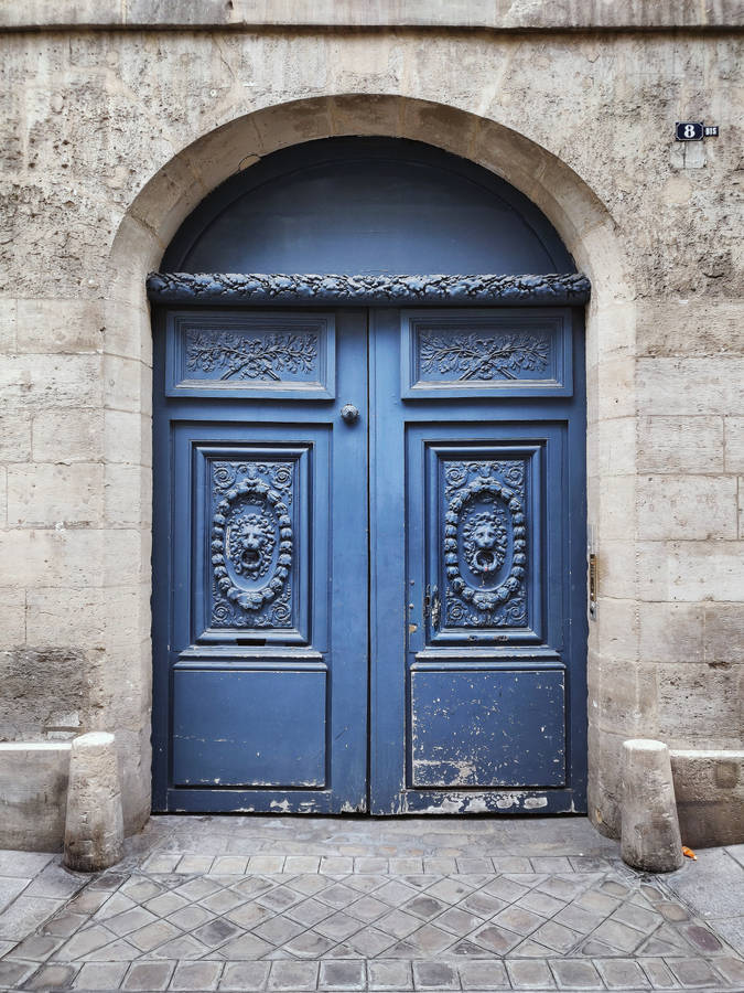 Blue Door Entrance Of Trudaine Family Residence Wallpaper