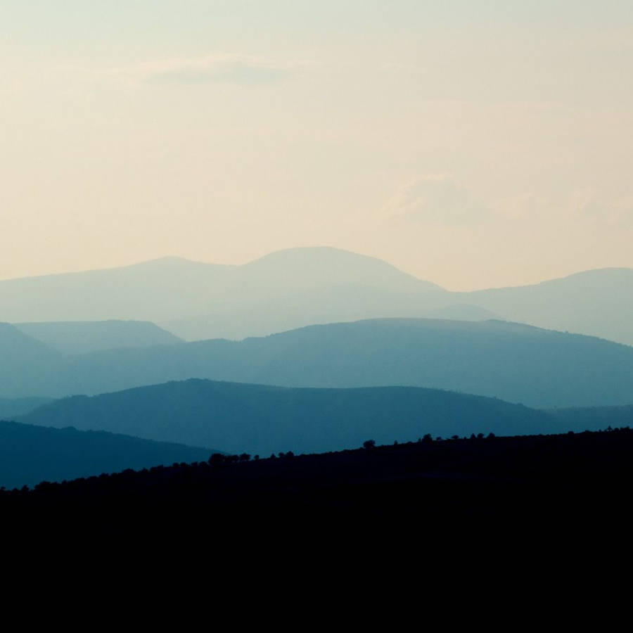 Blue Fade Mountain Range Wallpaper