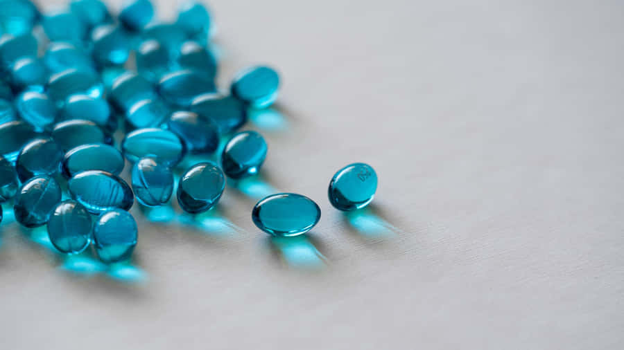 Blue Gel Capsules Medicine Background Wallpaper