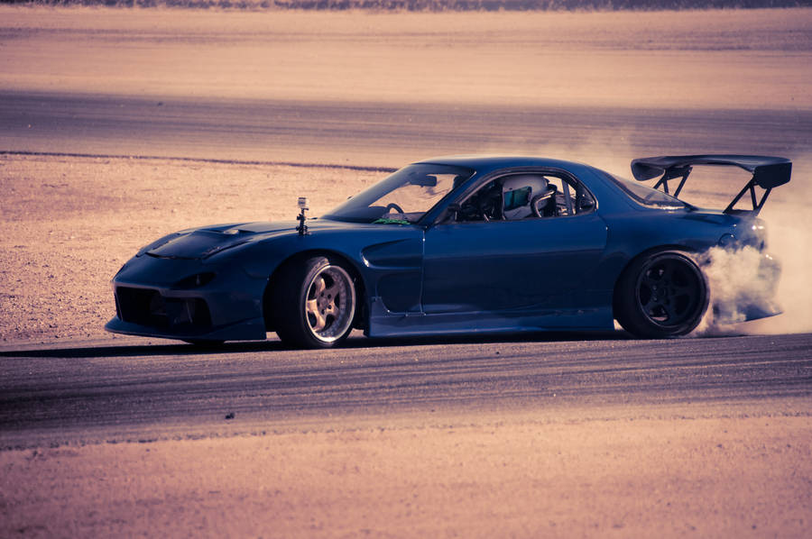 Blue Mazda Rx7 In Desert Wallpaper