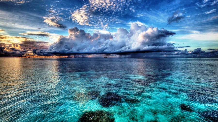 Blue Ocean With Thick Clouds Wallpaper
