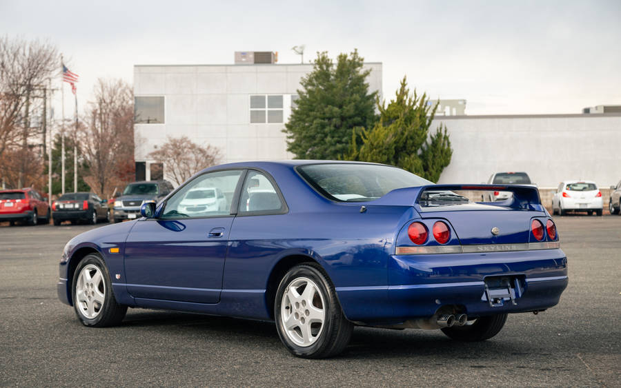 Blue Skyline Car Under Clear Blue Sky Wallpaper