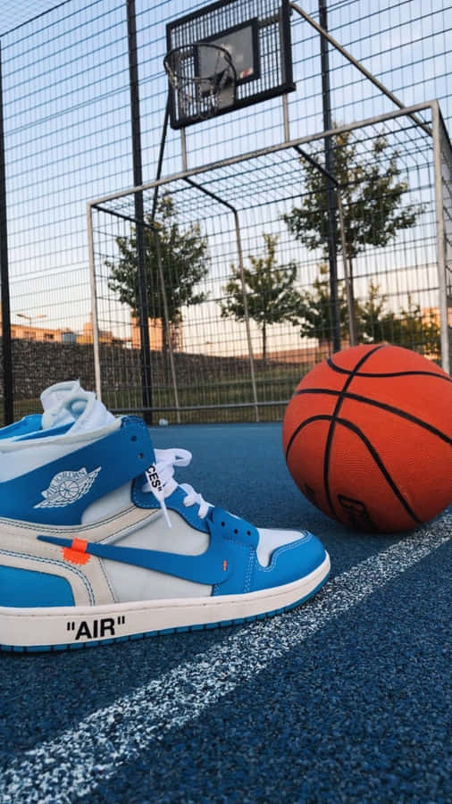 Blue Sneakers Basketball Court Evening Wallpaper